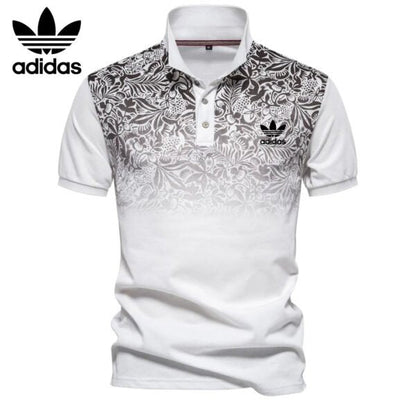 AD – Polo con motivo floreale sfumato