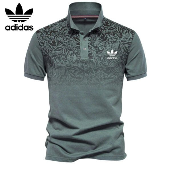 AD – Polo con motivo floreale sfumato