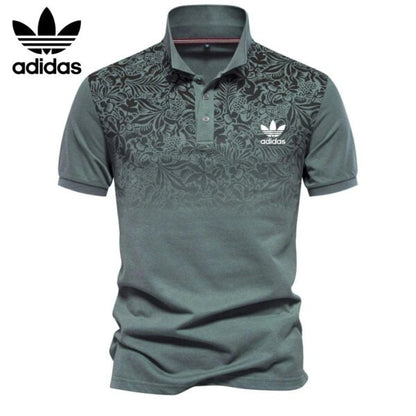 AD – Polo con motivo floreale sfumato