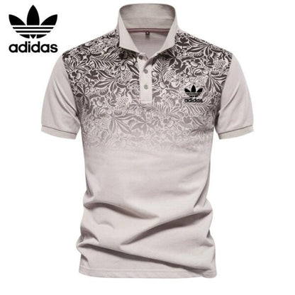 AD – Polo con motivo floreale sfumato