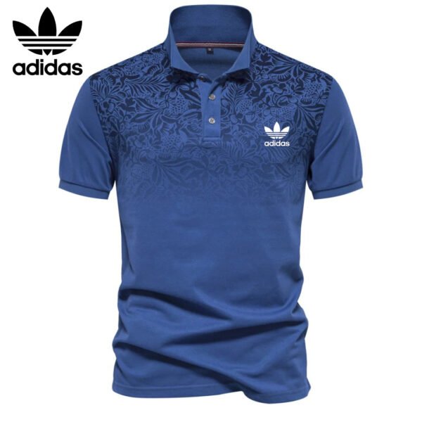 AD – Polo con motivo floreale sfumato