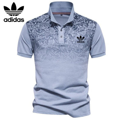 AD – Polo con motivo floreale sfumato